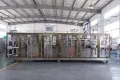 Горизонтальная фасовочно-упаковочная машина для пауч-пакетов с зип-замком с двумя дозирующими головками