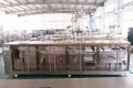 Сервоприводная машина для упаковки в готовые пауч-пакеты с четырьмя наполнительными головками
