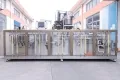Сервоприводная машина для упаковки в пауч-пакеты с носиком из рулонной плёнки с двумя наполнительными головками